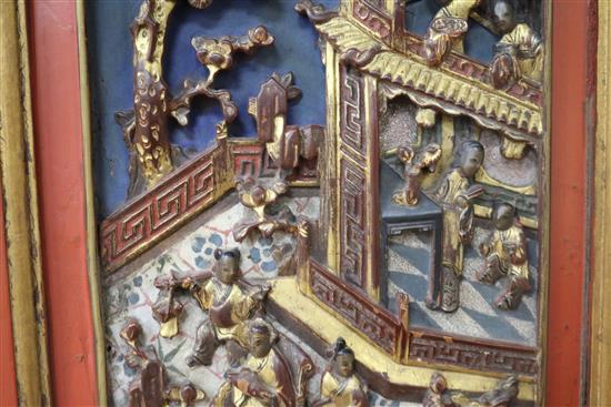 A Chinese gilt and red lacquered relief panel 84 x 32cm